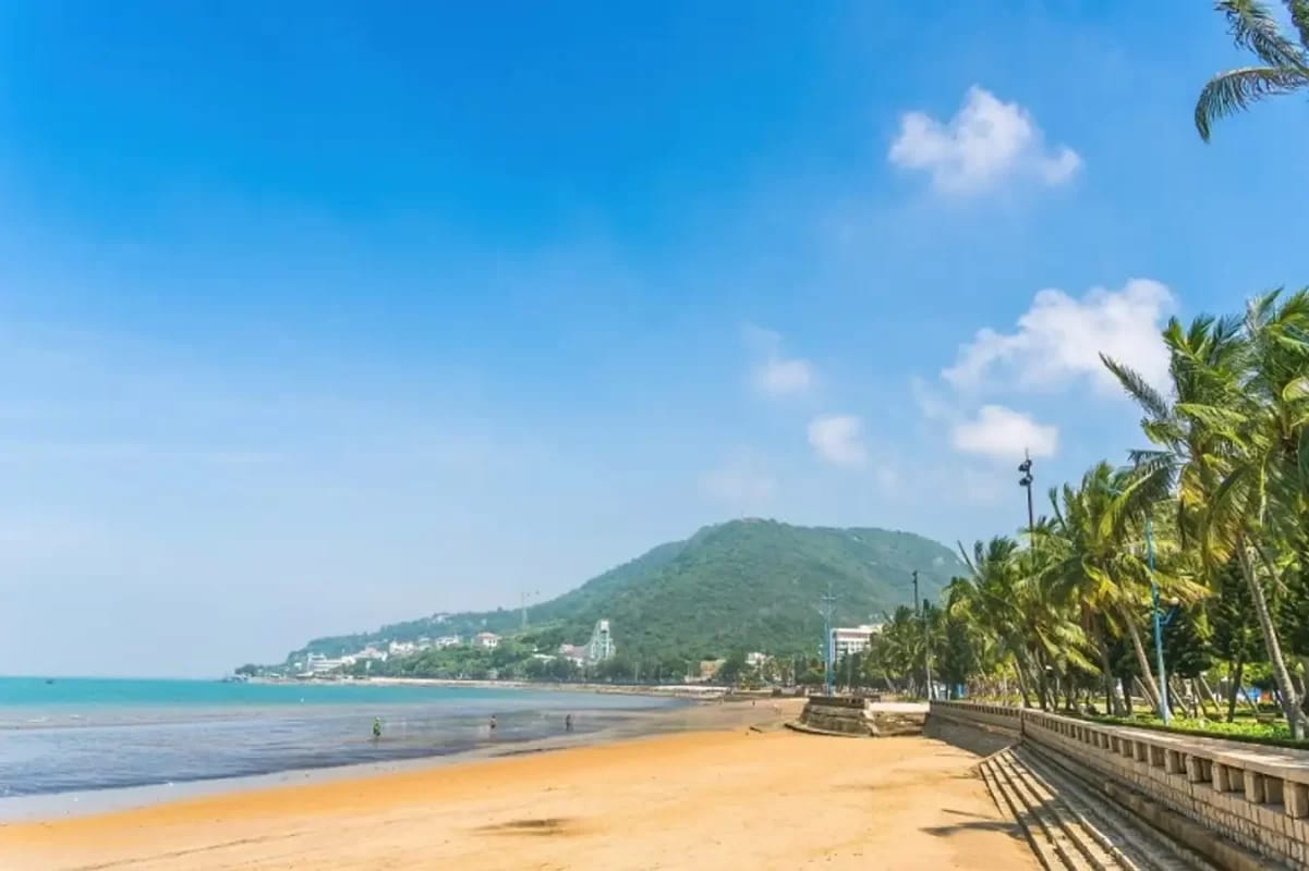 Front Beach's view against mountains and golden sky 